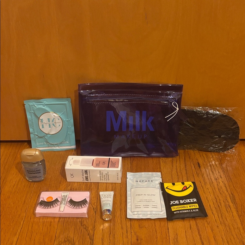 Milk Makeup Purple Bag with Beauty Essentials